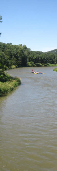 The Niobrara River with people floating around a wide bend